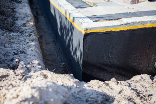 Professional Emergency Waterproofing technician working in Mukwonago, WI